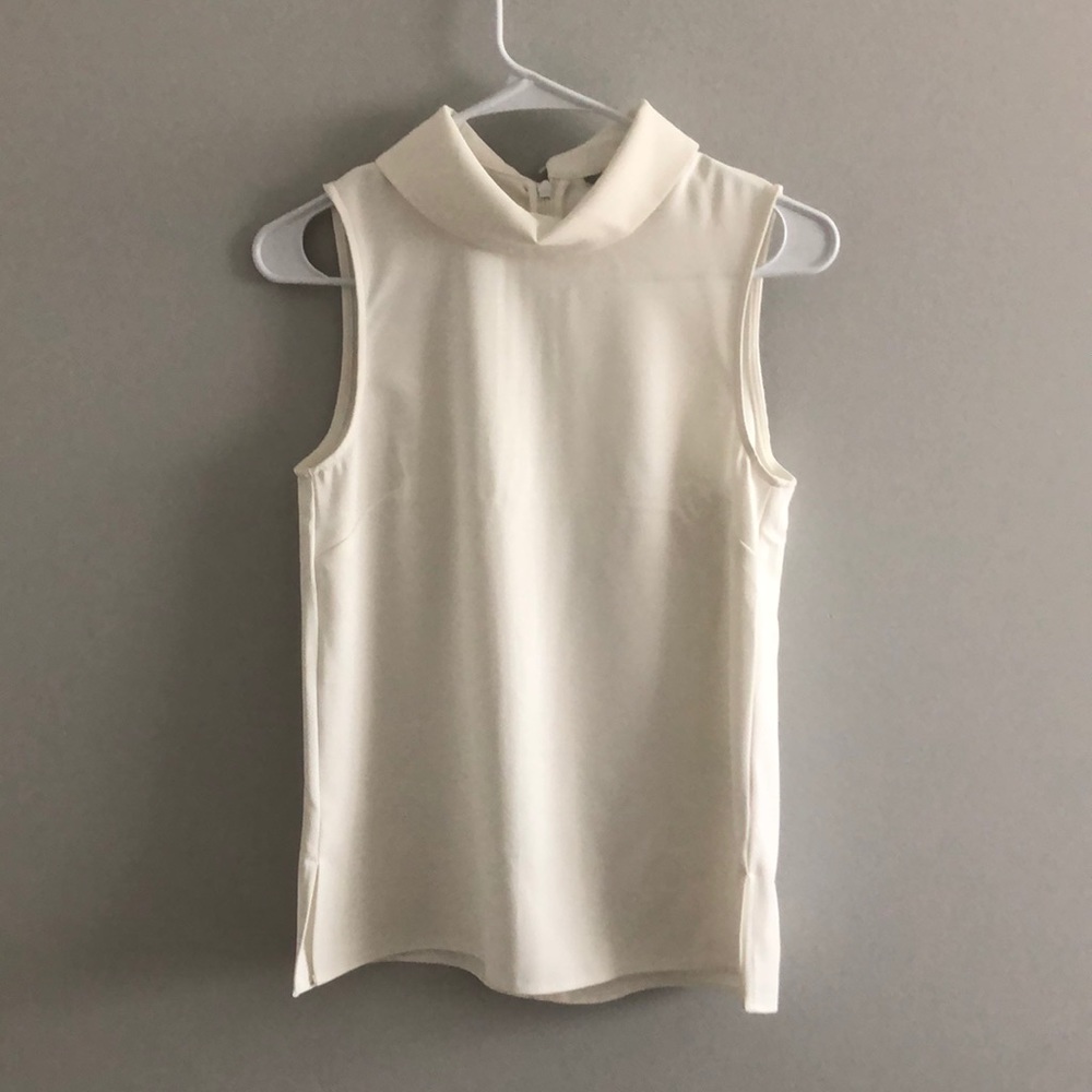 White Sleeveless Blouse